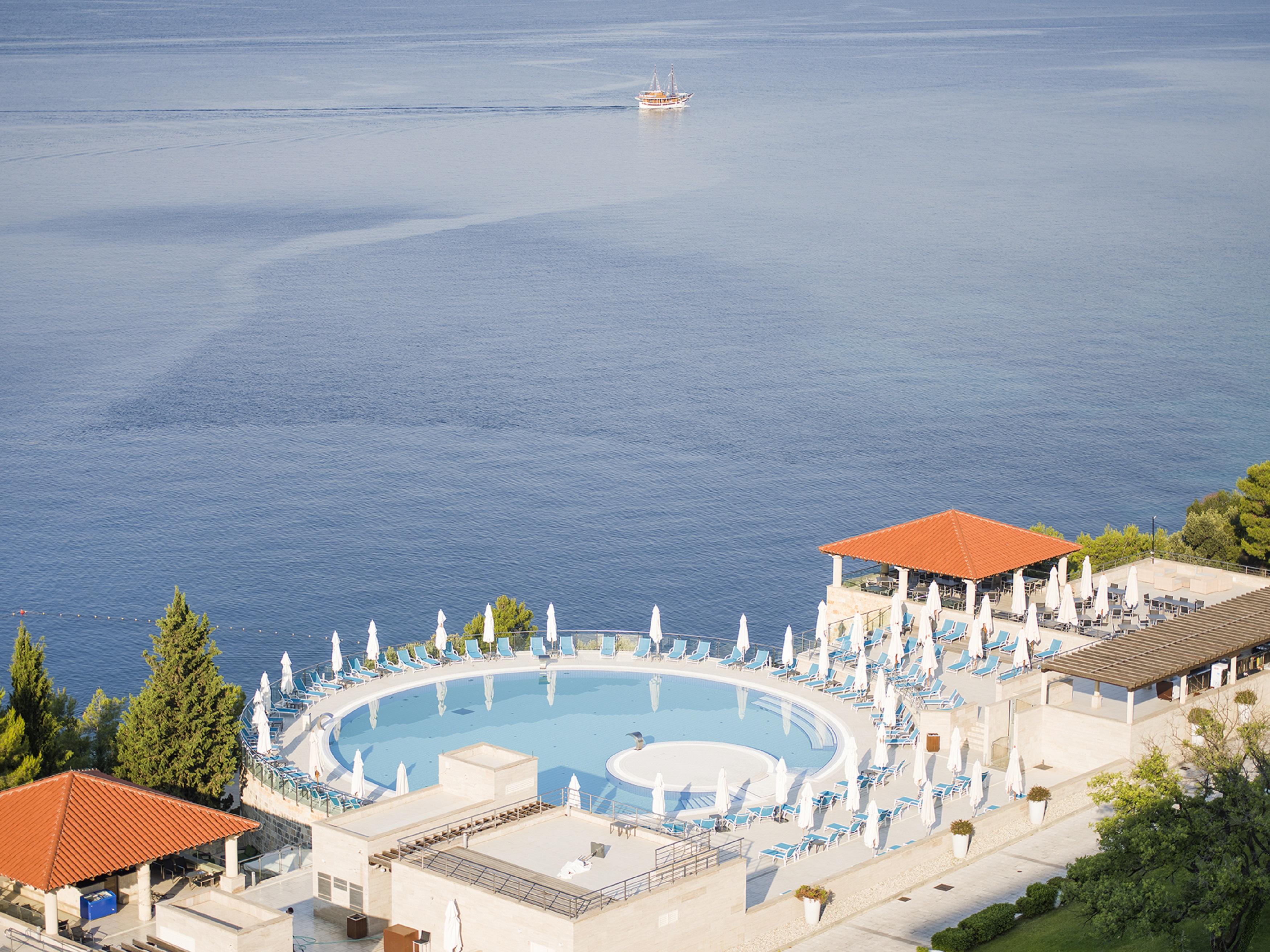 Hotel Sun Gardens Dubrovnik Orasac Esterno foto The pool at the hotel
